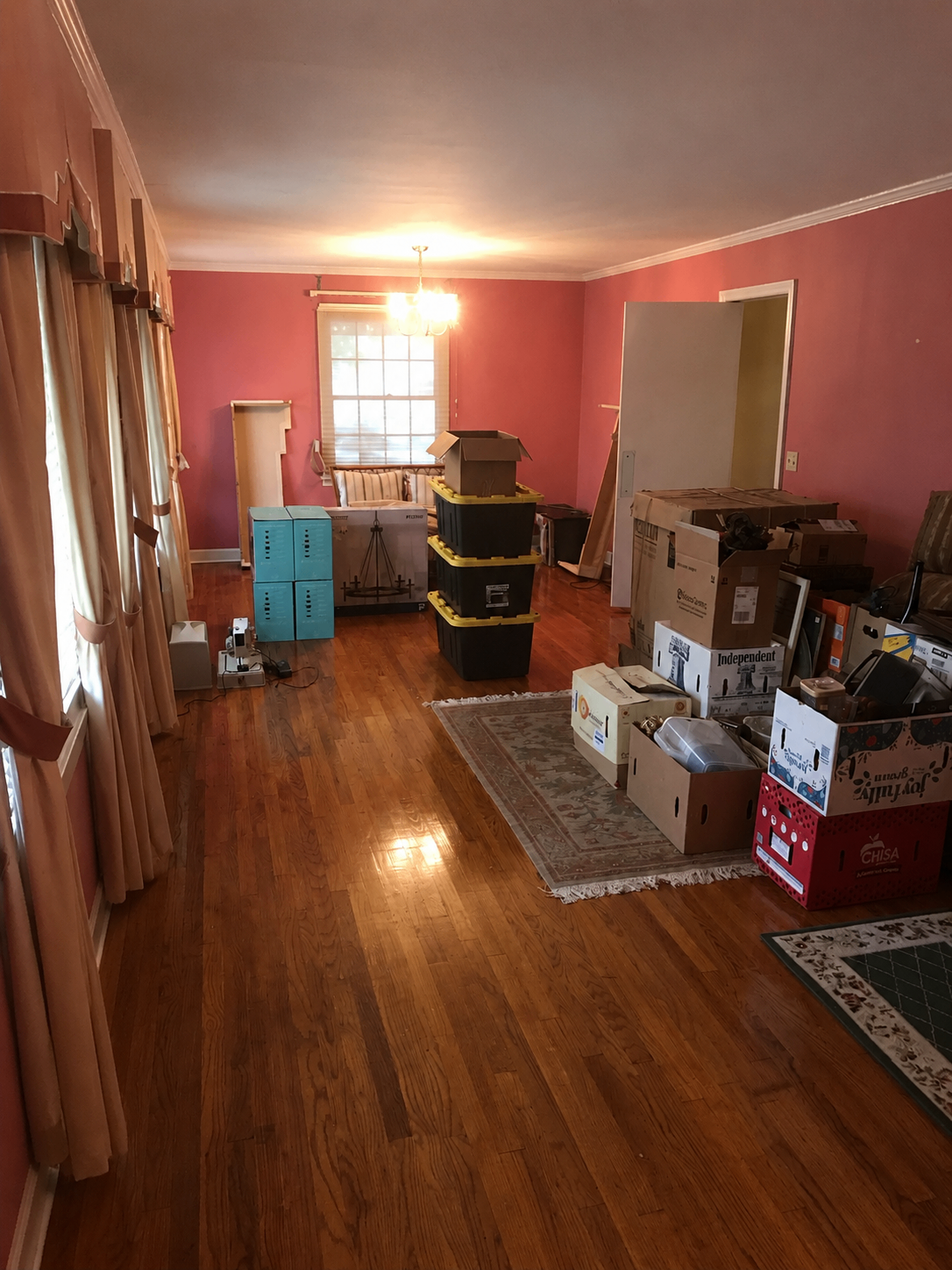 Before: Cluttered living room decluttered and staged for sale