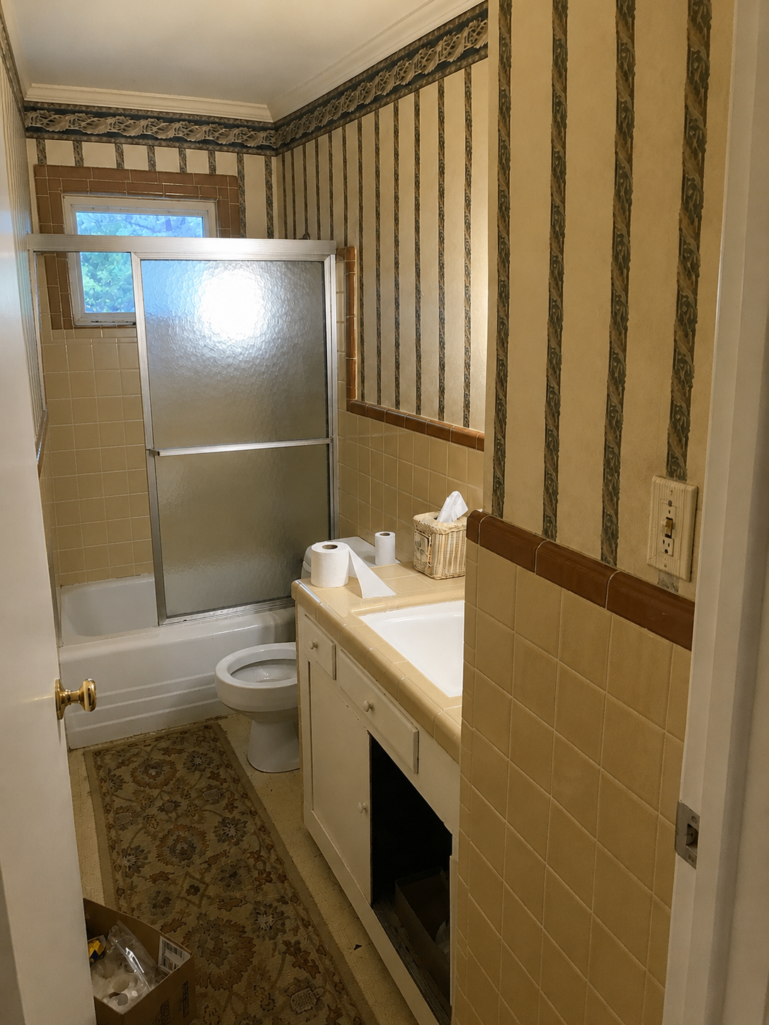 Before: Bathroom wallpaper removed